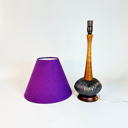 A sleek vintage mid-century modern tall table lamp + handmade lampshade crafted from luxurious purple textured recycled fabric.