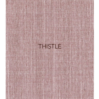 Thistle - The fabric used in this collection is a classic, yarn-dyed plain weave made from recycled olefin, embodying a faux linen look with a washed appearance. 