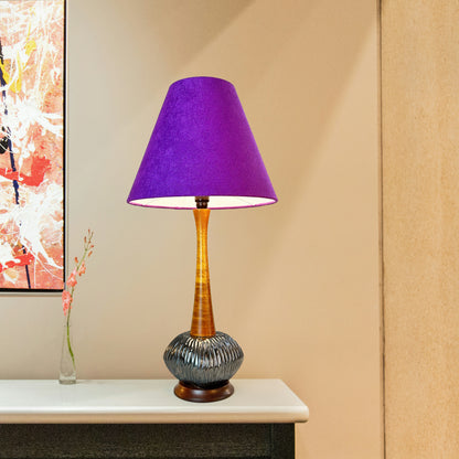 A sleek vintage mid-century modern tall table lamp + handmade lampshade crafted from luxurious purple textured recycled fabric.