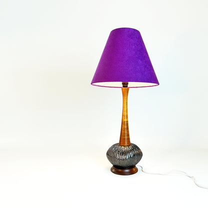 A sleek vintage mid-century modern tall table lamp + handmade lampshade crafted from luxurious purple textured recycled fabric.